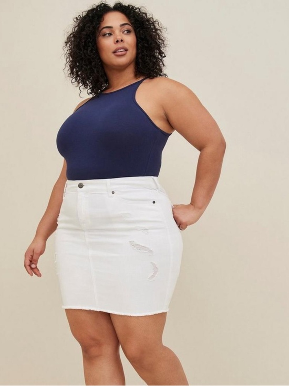 Torrid white distressed denim mini skirt. 16